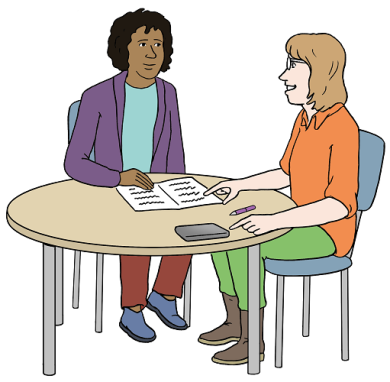 Consulting A woman advises another woman with the help of a brochure.