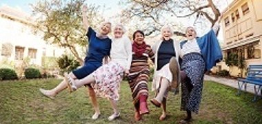 A cheerful group of senior women are dancing A cheerful group of senior women are dancing