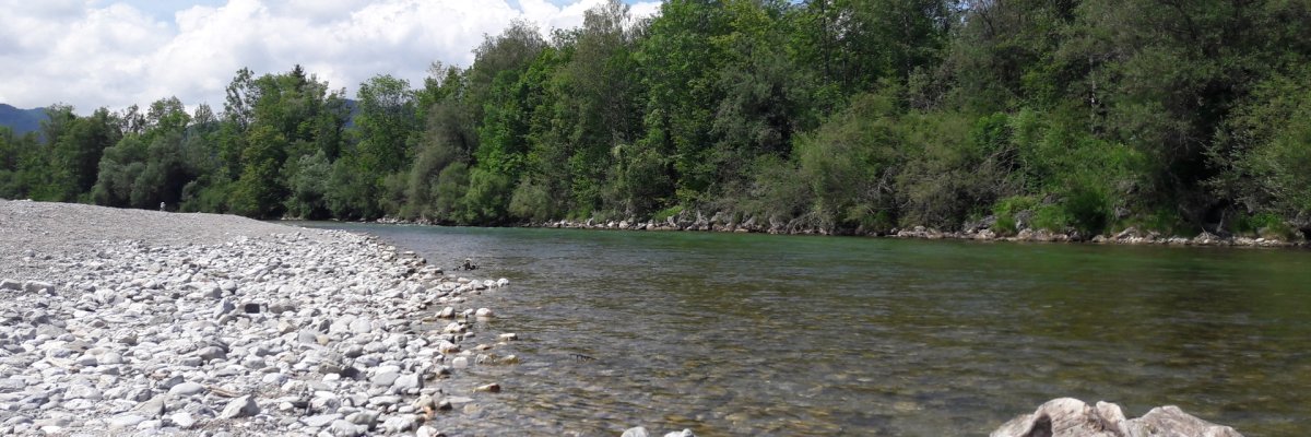 Isar picture with Steinmandl The picture shows the Isar with a stone man on the bank