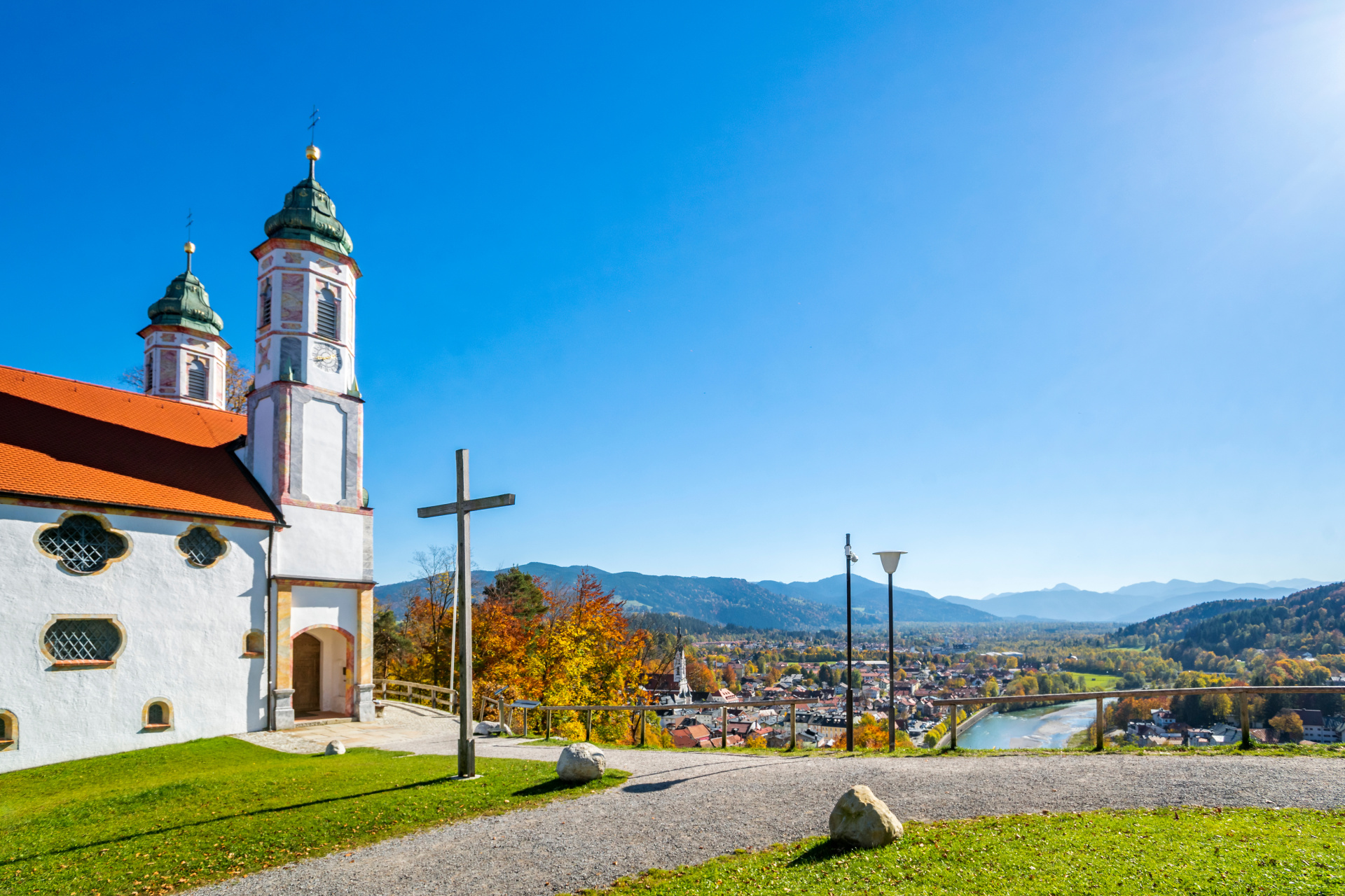 Photograph with a view of the church and over the town from the Calvary in Bad Tölz